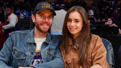 Lily Collins and Director Charlie McDowell Are Engaged -- See Her Ring! - www.etonline.com