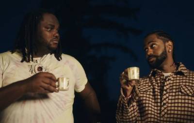 Big Sean and Tee Grizzley live the lavish life in ‘Trenches’ video - www.nme.com - Detroit - Choir
