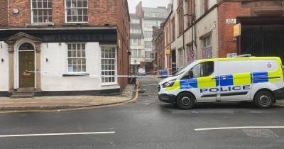 Woman found with neck injuries in Northern Quarter alleyway after 'running from vehicle' - www.manchestereveningnews.co.uk - Manchester