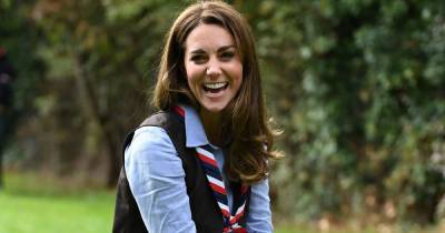 Kate Middleton wears jeans and a gilet to toast marshmallows during visit to London Scouts Group - www.ok.co.uk