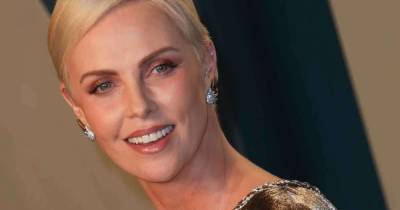 Charlize Theron shares incredibly rare photos with daughters Jackson and August - www.msn.com