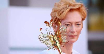 Tilda Swinton puts a glamorous spin on the red-carpet face mask - www.msn.com