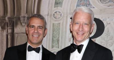 Anderson Cooper vows to get revenge on Andy Cohen for shirtless pics - www.wonderwall.com - county Anderson - county Cooper