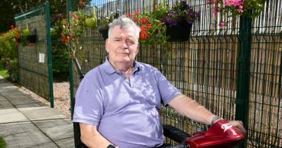 Pensioner with Parkinson’s disease forced to remove flower baskets after petty complaints - www.dailyrecord.co.uk
