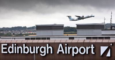 Independence activist charged over alleged 'England Get Out of Scotland' banner at Edinburgh airport - www.dailyrecord.co.uk - Scotland