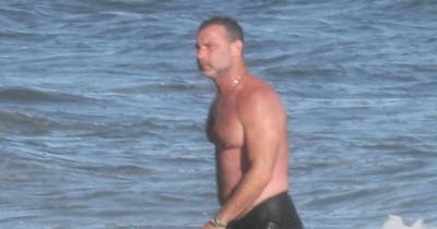 Liev Schreiber Goes Shirtless at the Beach in The Hamptons - www.justjared.com - New York - county Hampton