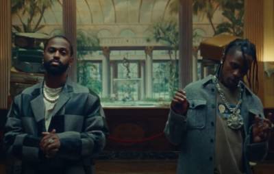 Big Sean shares spaced out video for new track ‘Lithuania’ featuring Travis Scott - www.nme.com - Detroit - Lithuania