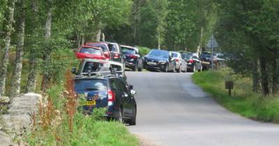 'Total madness' Warning as scores of cars swarm Scots beauty spot partly blocking rural road - www.dailyrecord.co.uk - Scotland