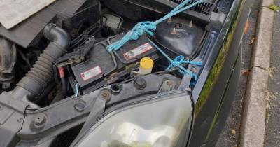 "He's not getting a Blue Peter badge for this homemade effort" - driver used old blue rope to secure car battery - www.manchestereveningnews.co.uk - Manchester