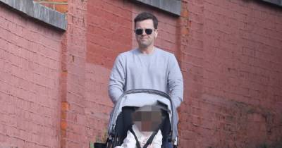 Declan Donnelly looks every inch the doting dad as he takes daughter Isla and adorable family dog for a walk - www.ok.co.uk - London