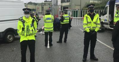 One person taken to hospital and six arrested after animal rights protesters climb roof of meat factory - www.manchestereveningnews.co.uk