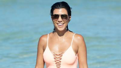 Kourtney Kardashian Rocks Pink Bikini During Fun Boat Ride With Scott Disick Their Son Reign, 6 - hollywoodlife.com