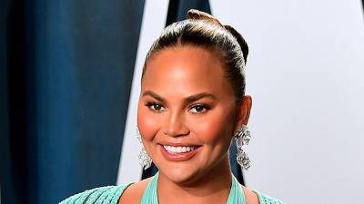 Chrissy Teigen Bares All 6 Months After Removing Breast Implants As She Celebrates NYE In The Caribbean - hollywoodlife.com