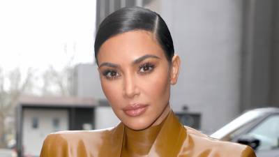Kim Kardashian Says Saint 'Still Looks Cute' After Cutting Out a Chunk of His Hair - www.etonline.com