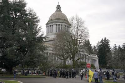 Protesters gathered outside Capitol in Olympia, Washington state, Sunday - www.foxnews.com - state Washington