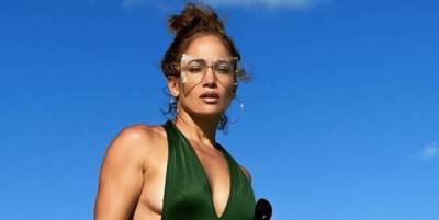 Here's Jennifer Lopez Looking Like a Goddess in a High-Cut Halter One-Piece - www.elle.com