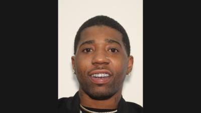 Rapper YFN Lucci Surrenders to Police on Murder Charges - www.etonline.com - Atlanta