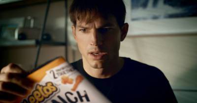 Ashton Kutcher Makes a Shocking Discovery in Cheetos Super Bowl Commercial Teaser: Watch - www.usmagazine.com
