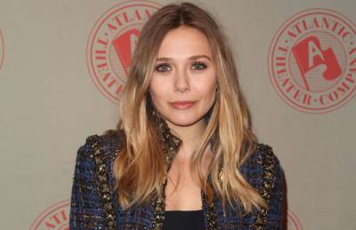 Elizabeth Olsen says it was “very scary” being followed by paparazzi as a child - www.nme.com