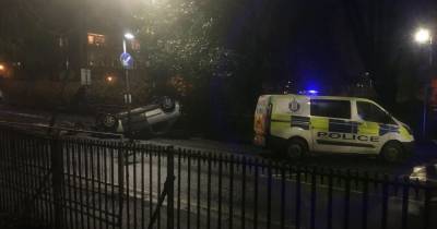 Car flips onto roof in horror crash in Glasgow as cops shut road - www.dailyrecord.co.uk