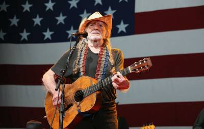 Willie Nelson receives first dose of coronavirus vaccine at drive-through - www.nme.com - Texas - county Cedar