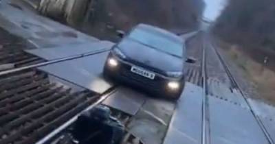 Police slam TikTok video of car photoshoot on live railway line near Bolton as 'sheer stupidity' - www.manchestereveningnews.co.uk - Britain