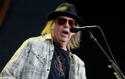 Neil Young announces new live album and concert film ‘Way Down In The Rust Bucket’ - www.nme.com - California - county Santa Cruz
