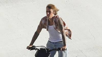 Justin Bieber Shows Off Muscles Tattoos In Sleeveless Top As He Rides A Motorcycle For New Video Shoot - hollywoodlife.com - California