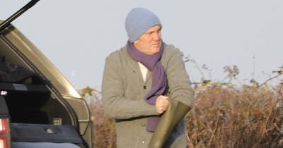 The Chase star Bradley Walsh enjoys muddy winter walk with rarely seen wife Donna and their puppy - www.ok.co.uk - Britain