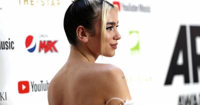 Dua Lipa responds to pregnancy speculation after telling photo caption sends fans wild - www.ok.co.uk