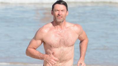 Hugh Jackman, 52, Goes Shirtless For Freezing ‘Polar Bear Plunge’ Swim On New Year’s Day — Watch - hollywoodlife.com