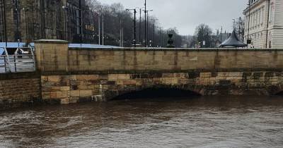 'Stay safe because this isn't looking great': River Roch at highest levels for a 'long time' as businesses forced to put up flood defences - www.manchestereveningnews.co.uk - Manchester