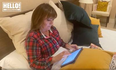 Lorraine Kelly cosies up in bed as she talks working from home - hellomagazine.com