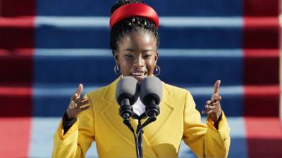 Watch Poet Amanda Gorman's Historic and Showstopping Reading at the Biden Inauguration - www.etonline.com