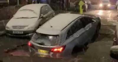 Car 'swallowed' by sinkhole on Manchester street - www.manchestereveningnews.co.uk - Manchester