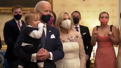 President Joe Biden Cuddles Baby Grandson Beau During Inauguration Day Special - www.etonline.com