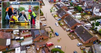 Dramatic pictures show people being rescued as Warrington streets flooded amid Storm Christoph chaos - www.manchestereveningnews.co.uk