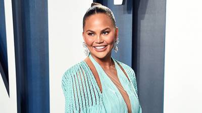 Chrissy Teigen Shockingly Loses A Tooth After She Bites Into A Fruit Roll-Up - hollywoodlife.com