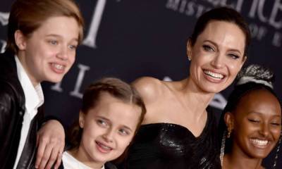Angelina Jolie looks just like daughter Vivienne in unbelievable throwback photo - hellomagazine.com