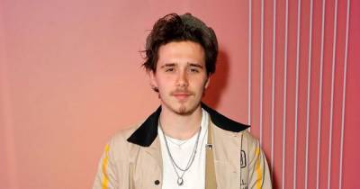 Brooklyn Beckham divides fans with new 'future wifey' neck tattoo - www.dailyrecord.co.uk