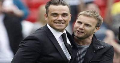 Gary Barlow admits he doesn't take pants off in front of people as Robbie Williams 'made fun of his bits' - www.ok.co.uk