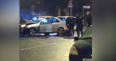 Moment armed police detained robbery suspect following chase that ended in smash on major road - www.manchestereveningnews.co.uk - Manchester