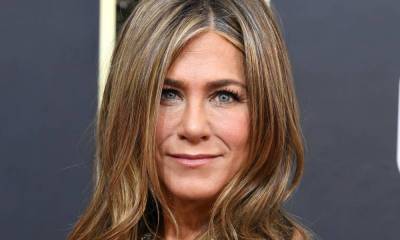 Jennifer Aniston wows in gothic outfit and wild hair in unbelievable throwback photo - hellomagazine.com