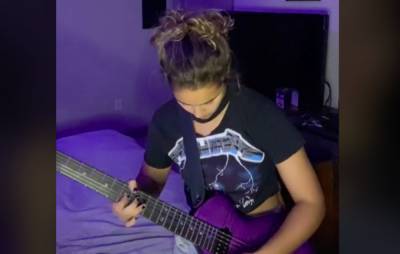 TikTok star who was mocked for wearing Metallica t-shirt performs favourite riffs - www.nme.com