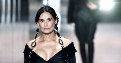 Demi Moore shows off very different look and sparks surgery speculation after runway walk - www.ok.co.uk - Paris