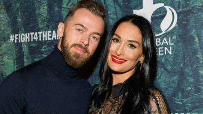 Nikki Bella Says She and Fiancé Artem Chigvintsev Are in Therapy: 'He Doesn't Realize His Tone' - www.etonline.com