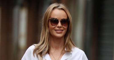 Amanda Holden cuts a stylish figure as she showcases tanned legs in mini skirt after work - www.ok.co.uk