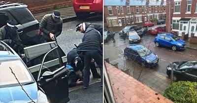 The dramatic moment armed police pin suspect down in the street, before finding grenades in his bag - a huge investigation into organised crime continues - www.manchestereveningnews.co.uk
