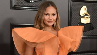 Chrissy Teigen Gets Her Nose Pierced Again After First Botched Attempt: 'Second Time's the Charm' - www.etonline.com - Los Angeles