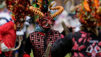 Devils dance, observe virus protocols at Ecuador festival - abcnews.go.com - Ecuador